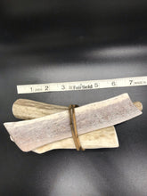Three-piece Natural dog chew bundle made from naturally shed elk antlers for small and medium dogs, three hand-cut pieces with size reference