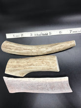 Naturally shed elk antler natural dog chews for small and medium dogs showing individual hand-cut pieces and size