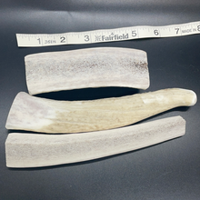 Variety of hand-cut natural dog chews from naturally shed elk antlers for small and medium dogs